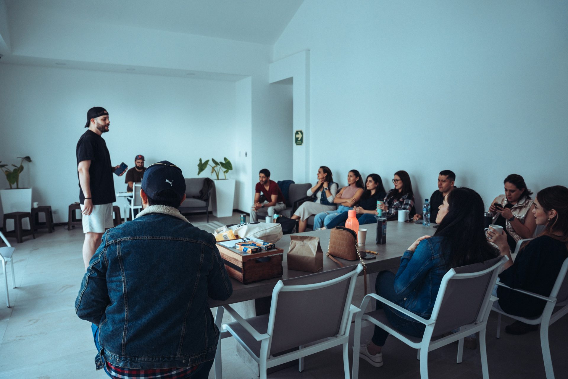 a group of people sitting around a table
